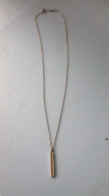 One sterling Silver lady's Tag pendant on chain. Trademark is Tiffany & Co.