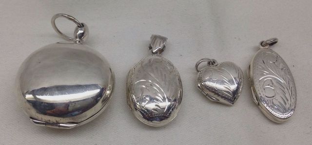Four Various Sterling Silver Lady's Pendants