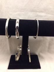 Five Sterling Silver Lady's Hinged Bangle Bracelets.