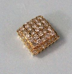 One diamond pendant measuring 16.0mm square and cast of 14K yellow gold with a high polish. Prong set in the center in five rows are 25 round, brilliant cut diamonds measuring 2.2mm each and weighing approximately 1.90 carats total with VS2-SI1 