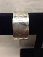One Sterling Silver Lady's Hinged Bangle Bracelets.