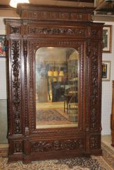 Mid 1880s Heavily Carved Walnut Armoire