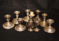 Four Sets of Small Sterling Candlesticks