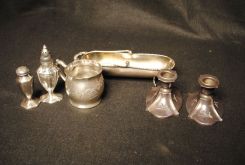 Four Piece Silverplate Lot Including a Pair of Brass Candlesticks